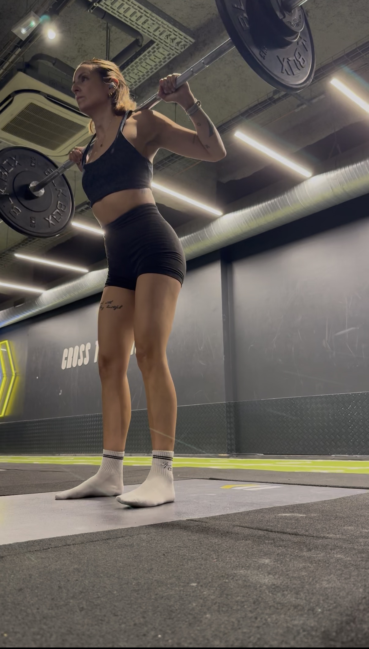Squat avec haltères pour préserver la masse musculaire après 40 ans